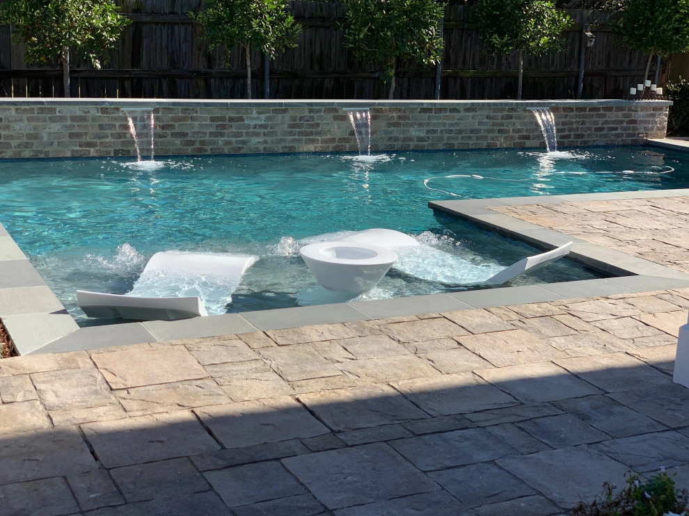 L-Shaped Pool with Stone Deck by Artscape Land Design - Photo 2