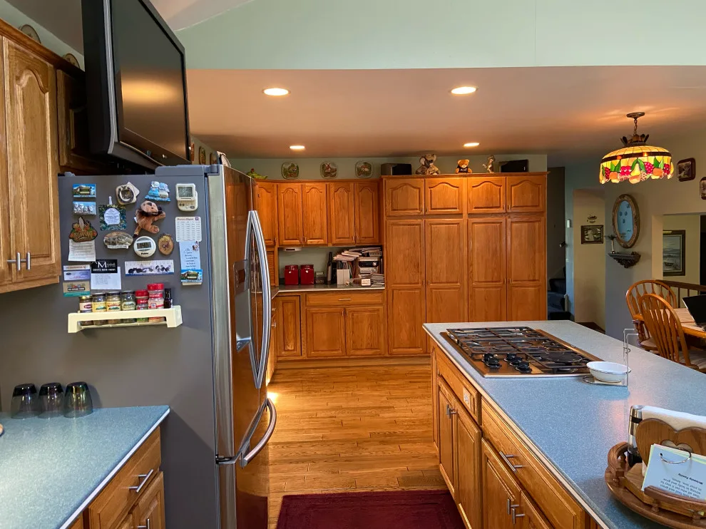 Classic Kitchen Renovation in Snow White with Walnut Glaze by Kitchen Solvers Of Grayslake - Photo 21