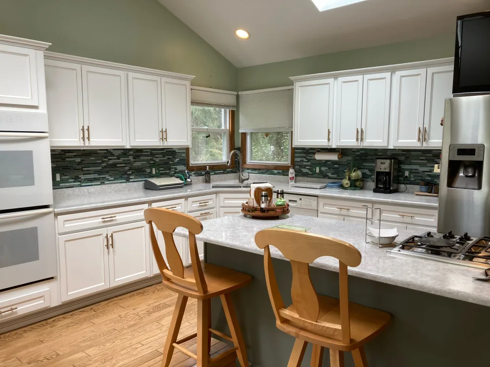 Classic Kitchen Renovation in Snow White with Walnut Glaze by Kitchen Solvers Of Grayslake - Photo 16