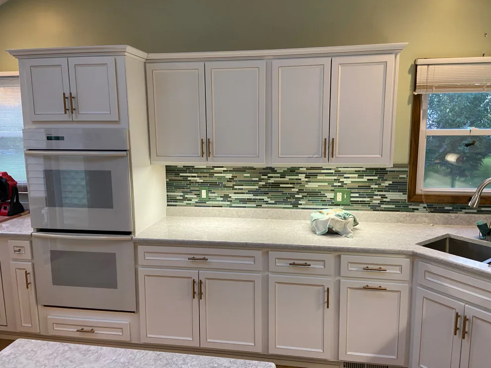 Classic Kitchen Renovation in Snow White with Walnut Glaze by Kitchen Solvers Of Grayslake - Photo 13