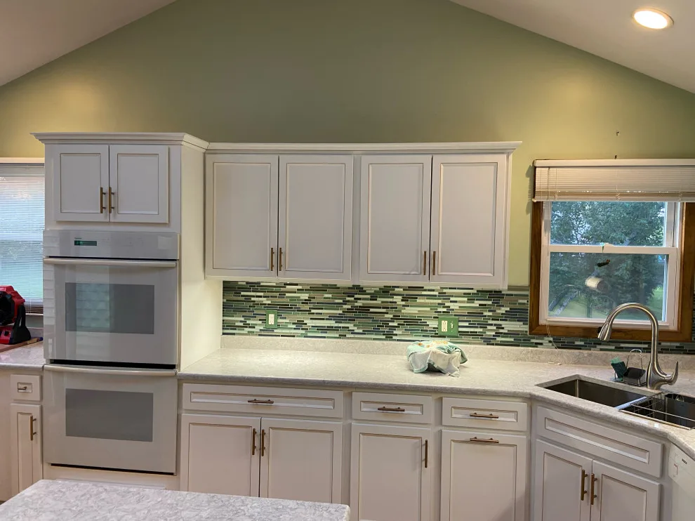 Classic Kitchen Renovation in Snow White with Walnut Glaze by Kitchen Solvers Of Grayslake - Photo 12