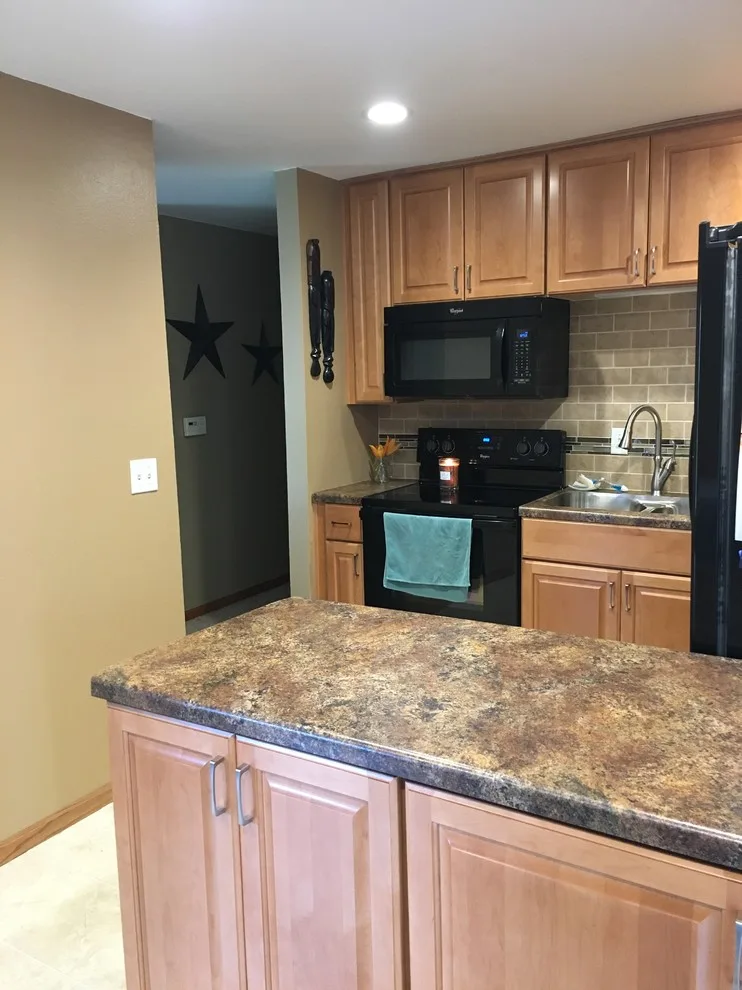 Maple Traditional Kitchen Renovation by Kitchen Solvers Of Eau Claire - Photo 6
