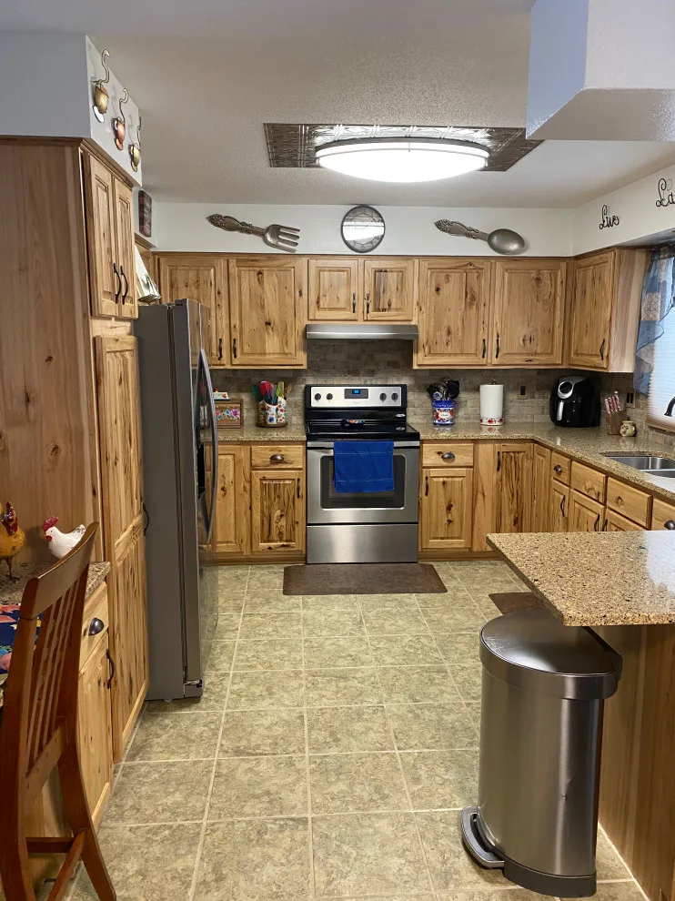 Rustic Brown Hickory Traditional Kitchen Renovation by Kitchen Solvers Of Eau Claire - Photo 5