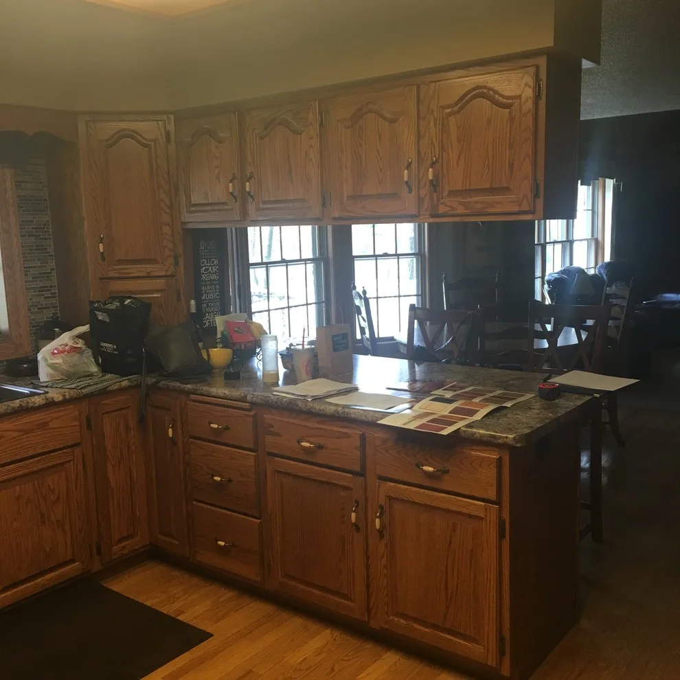 Biscuit-Colored Kitchen Renovation with Chocolate Glaze by Kitchen Solvers Of Eau Claire - Photo 8