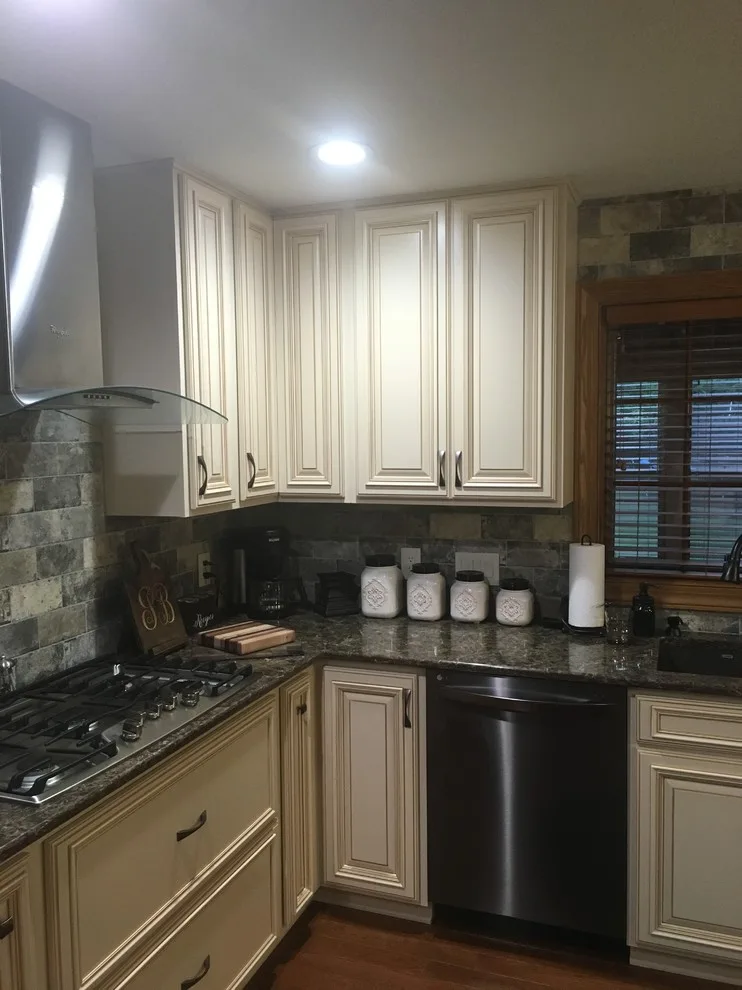 Biscuit-Colored Kitchen Renovation with Chocolate Glaze by Kitchen Solvers Of Eau Claire - Photo 2