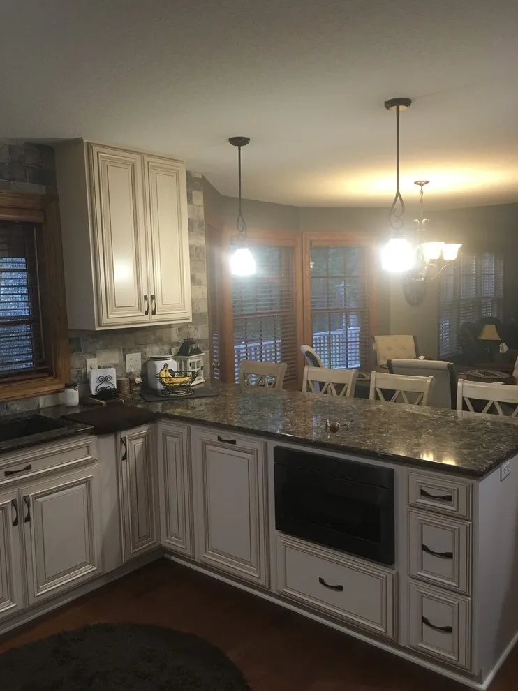 Biscuit-Colored Kitchen Renovation with Chocolate Glaze by Kitchen Solvers Of Eau Claire - Photo 14