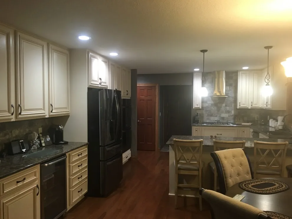 Biscuit-Colored Kitchen Renovation with Chocolate Glaze by Kitchen Solvers Of Eau Claire - Photo 3