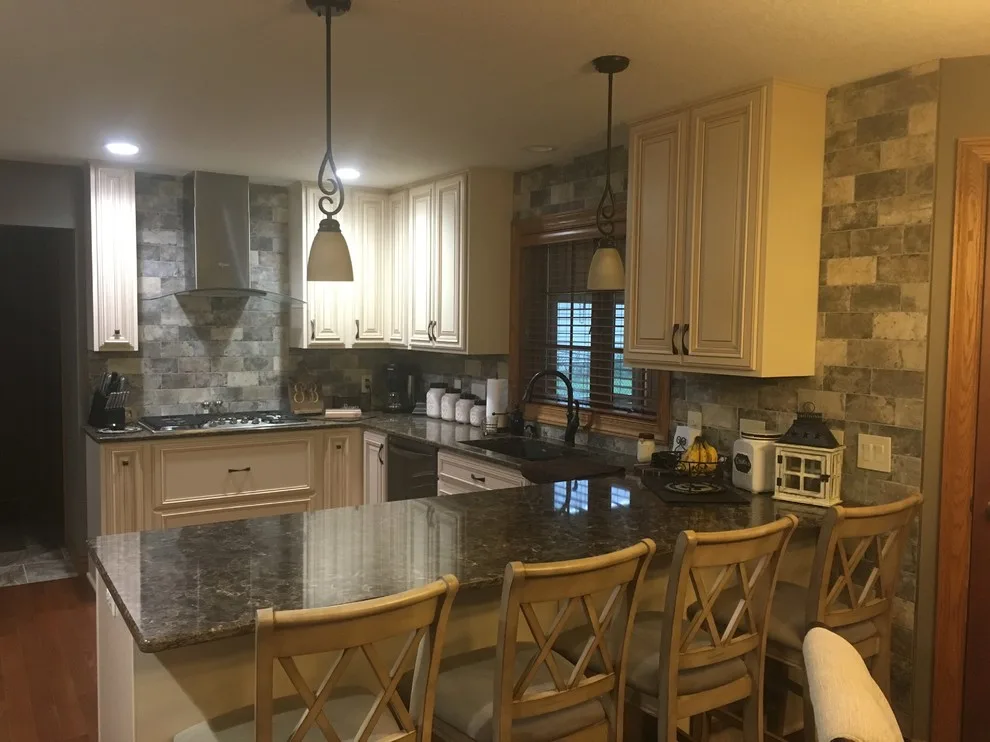 Biscuit-Colored Kitchen Renovation with Chocolate Glaze by Kitchen Solvers Of Eau Claire - Photo 19