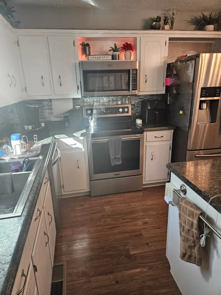 Hybrid Kitchen Renovation for Transitioning Spaces by Kitchen Solvers Of Spring Hill - Photo 9