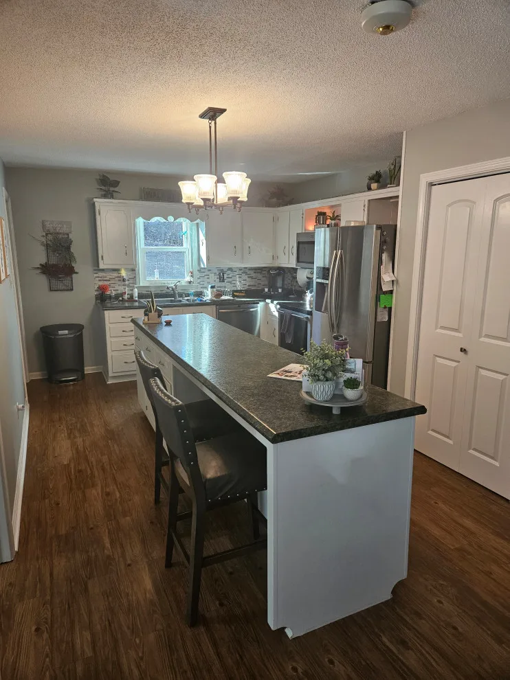 Hybrid Kitchen Renovation for Transitioning Spaces by Kitchen Solvers Of Spring Hill - Photo 11