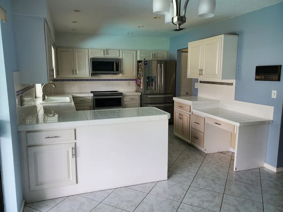 Matte White Transitional Kitchen Renovation by Kitchen Solvers Of Fort Lauderdale - Photo 12