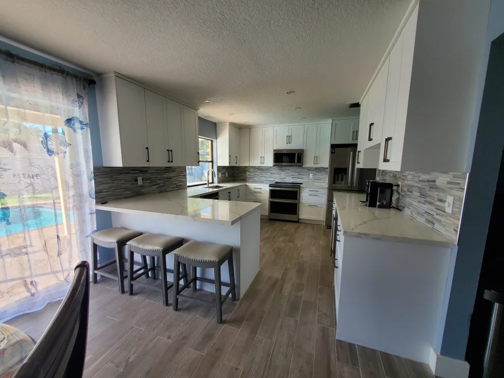 Matte White Transitional Kitchen Renovation by Kitchen Solvers Of Fort Lauderdale - Photo 16