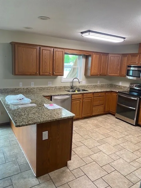 Snow-Colored Transitional Kitchen Renovation by Kitchen Solvers Of Fort Wayne & Toledo - Photo 5