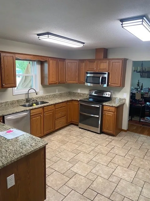 Snow-Colored Transitional Kitchen Renovation by Kitchen Solvers Of Fort Wayne & Toledo - Photo 3