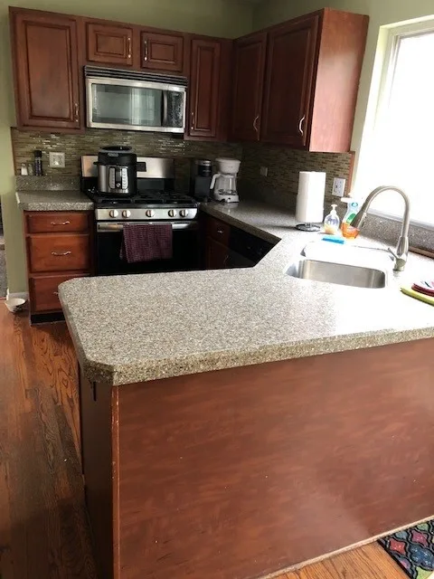 Two-Tone Kitchen Remodel Transition by Kitchen Solvers Of Grayslake - Photo 2