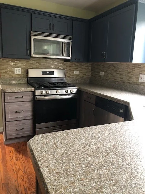 Two-Tone Kitchen Remodel Transition by Kitchen Solvers Of Grayslake - Photo 7
