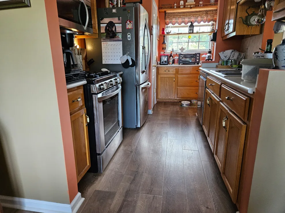 Dual-Tone Kitchen Renovation Completed by Kitchen Solvers Of Spring Hill - Photo 8