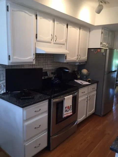 White Lowland Door Transitional Kitchen Renovation by Kitchen Solvers Of Oklahoma City - Photo 3