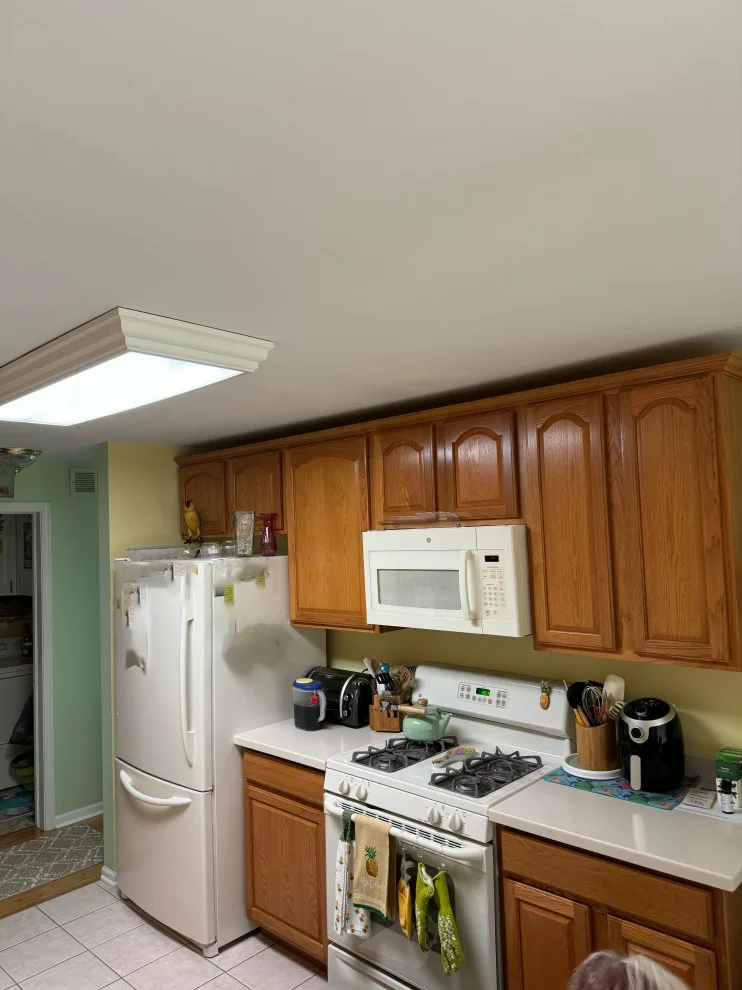 Hudson White Cabinets Kitchen Remodel in Transition by Kitchen Solvers Of Grayslake - Photo 4
