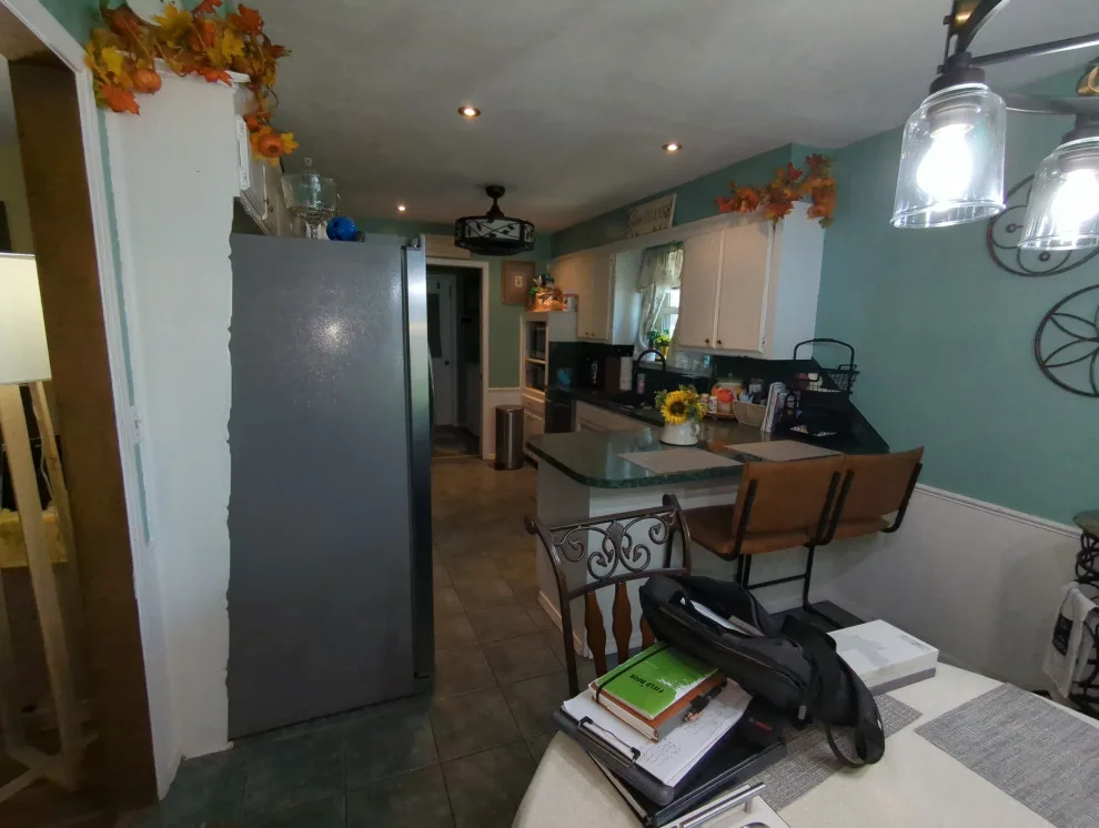 Mythic Blue Cabinets Kitchen Renovation Complete by Kitchen Solvers Of Oklahoma City - Photo 2