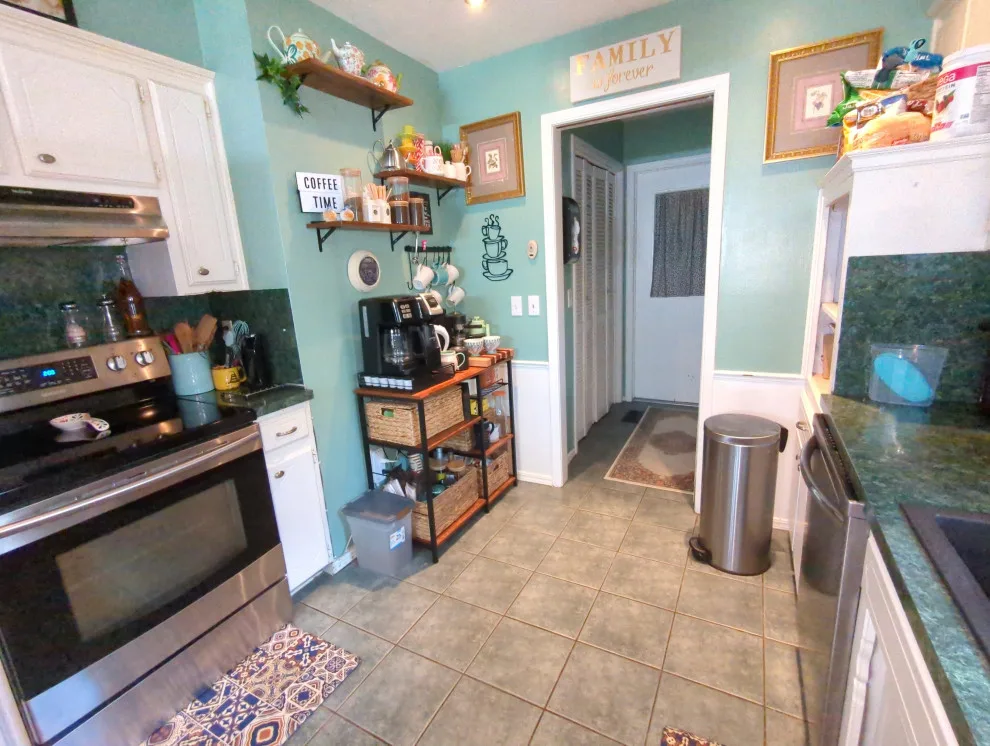 Mythic Blue Cabinets Kitchen Renovation Complete by Kitchen Solvers Of Oklahoma City - Photo 10