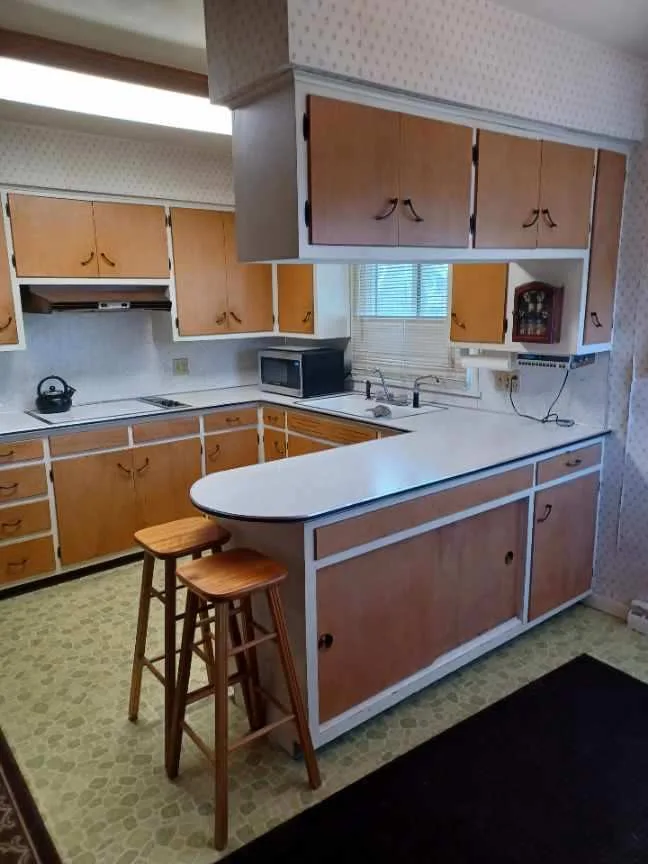 New Pebble Grey Cabinets for a Transitional Kitchen Remodel by Kitchen Solvers Of Fort Wayne & Toledo - Photo 3