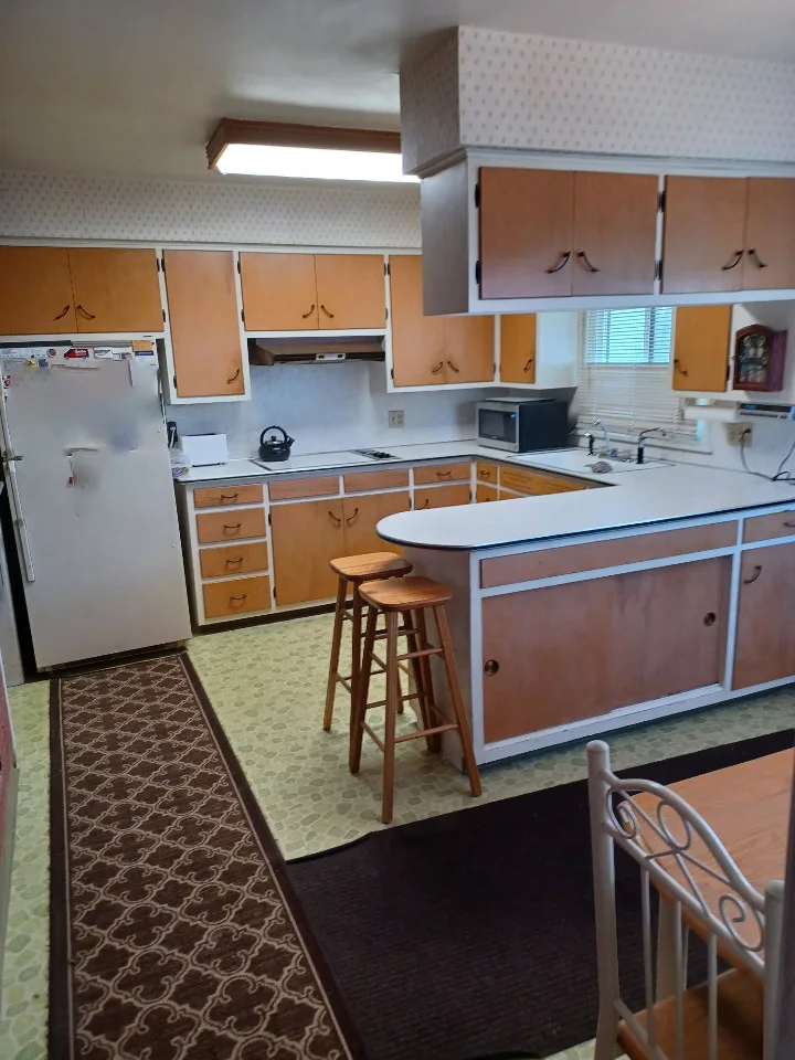New Pebble Grey Cabinets for a Transitional Kitchen Remodel by Kitchen Solvers Of Fort Wayne & Toledo - Photo 6