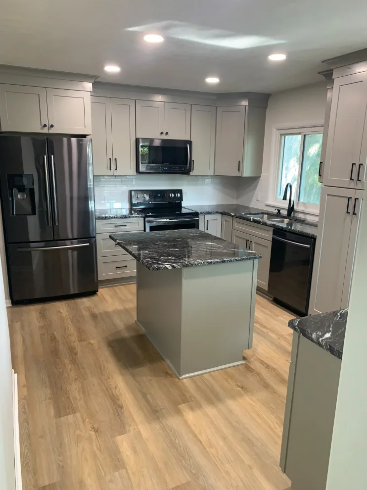 New Pebble Grey Cabinets for a Transitional Kitchen Remodel by Kitchen Solvers Of Fort Wayne & Toledo - Photo 7