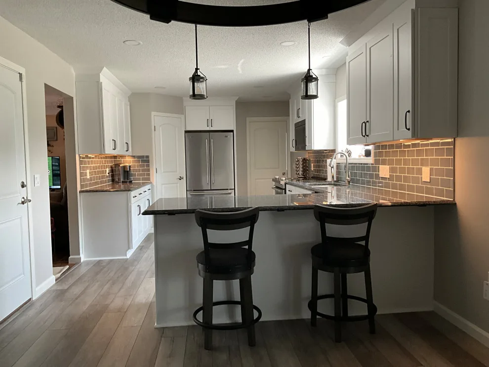 Kitchen Remodel Featuring New Polar White Cabinets by Kitchen Solvers Of Fort Wayne & Toledo - Photo 4