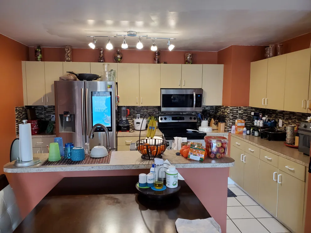 Modern Kitchen Renovation Featuring New White Cabinets by Kitchen Solvers Of Fort Lauderdale - Photo 6