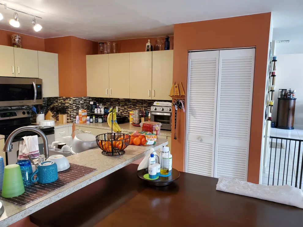 Modern Kitchen Renovation Featuring New White Cabinets by Kitchen Solvers Of Fort Lauderdale - Photo 15