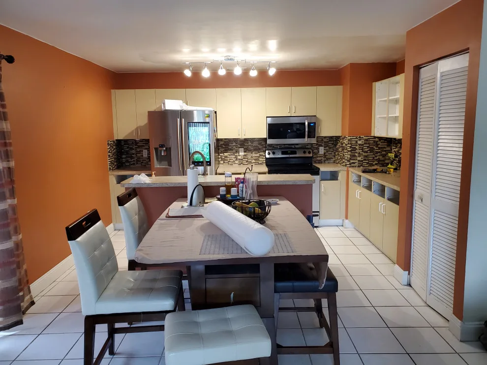 Modern Kitchen Renovation Featuring New White Cabinets by Kitchen Solvers Of Fort Lauderdale - Photo 2