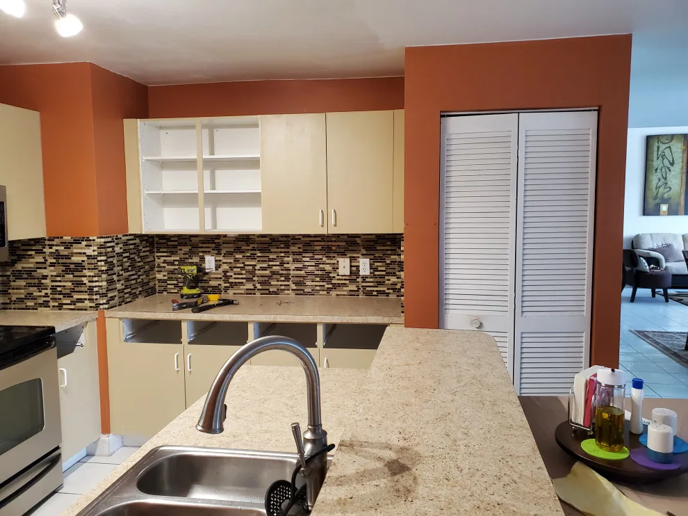 Modern Kitchen Renovation Featuring New White Cabinets by Kitchen Solvers Of Fort Lauderdale - Photo 7