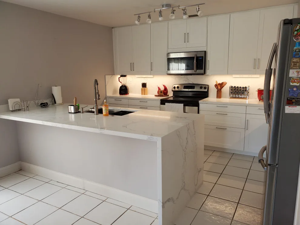 Modern Kitchen Renovation Featuring New White Cabinets by Kitchen Solvers Of Fort Lauderdale - Photo 4
