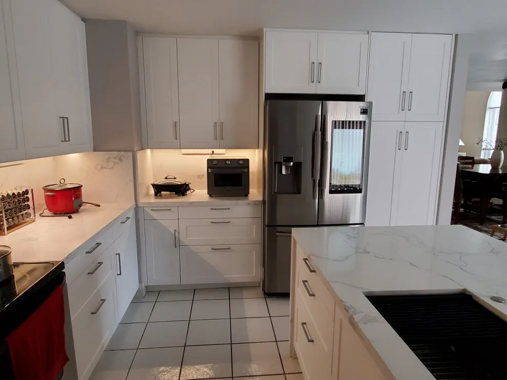 Modern Kitchen Renovation Featuring New White Cabinets by Kitchen Solvers Of Fort Lauderdale - Photo 5