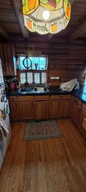 Spruce-Colored Cabinets for a Transitional Kitchen Renovation by Kitchen Solvers Of Eau Claire - Photo 7