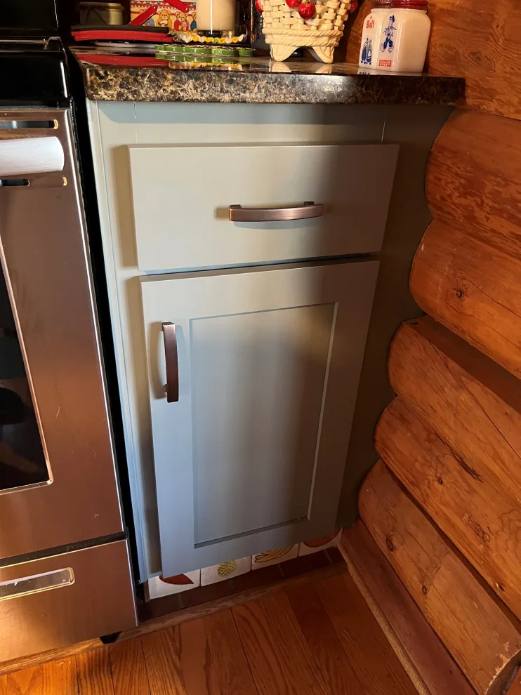 Spruce-Colored Cabinets for a Transitional Kitchen Renovation by Kitchen Solvers Of Eau Claire - Photo 9