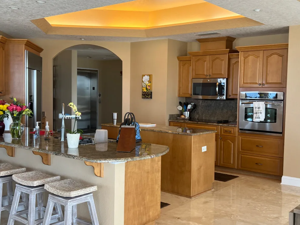 Warm Grey Cabinet Transitional Kitchen Renovation by Kitchen Solvers Of The Gulf Coast - Photo 8