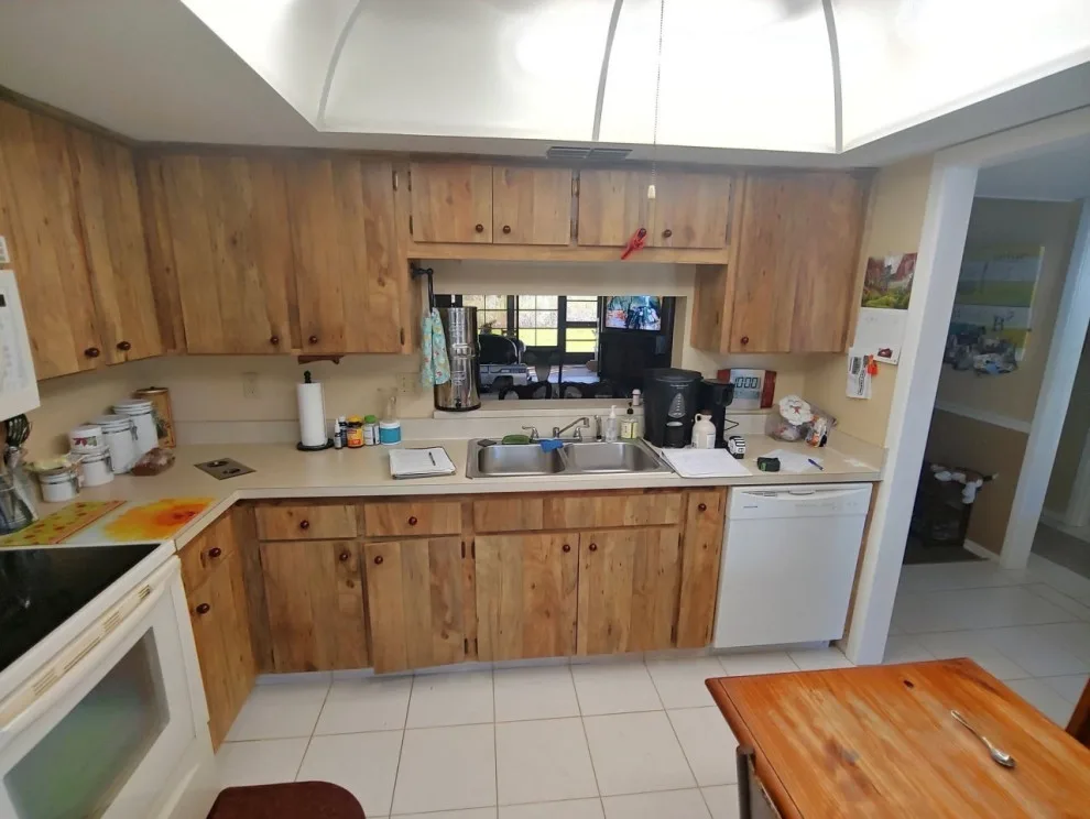 Aloe Shaker Bevel Kitchen Remodel Transformation by Kitchen Solvers Of The Gulf Coast - Photo 3
