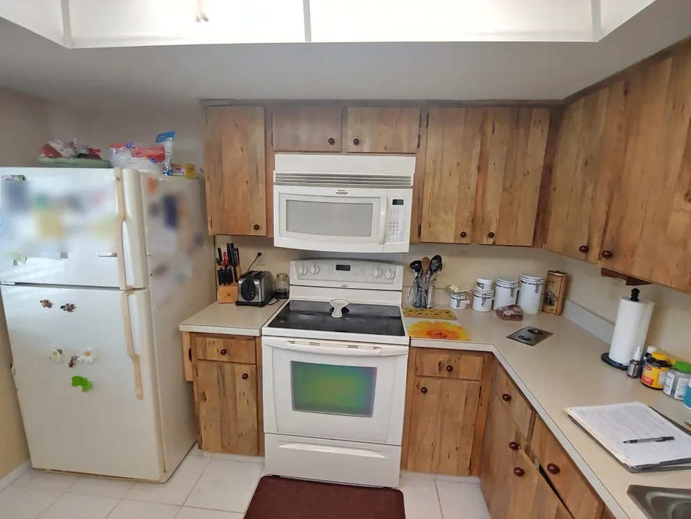 Aloe Shaker Bevel Kitchen Remodel Transformation by Kitchen Solvers Of The Gulf Coast - Photo 2