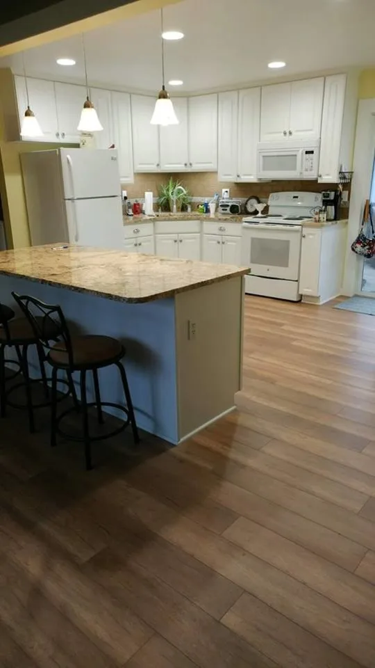 Kitchen Renovation for Transitioning Spaces by July's Quality Construction & Remodeling - Photo 6