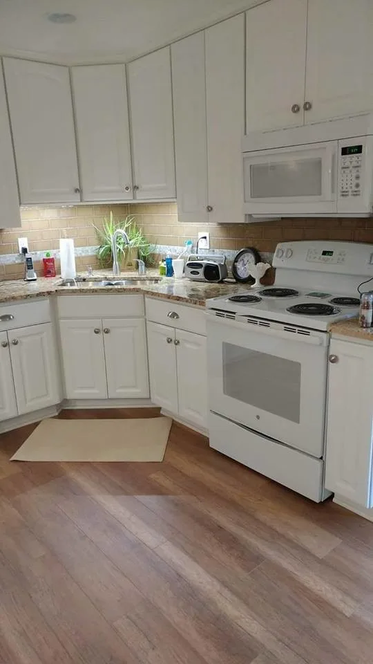 Kitchen Renovation for Transitioning Spaces by July's Quality Construction & Remodeling - Photo 2