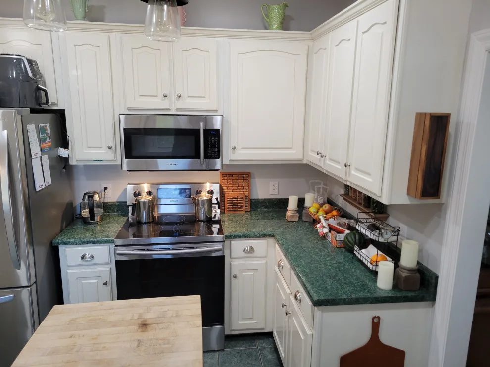 Modern Kitchen Renovation Featuring Various Storage Solutions by Kitchen Solvers Of Spring Hill - Photo 7