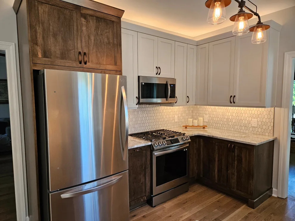 Modern Kitchen Renovation Featuring Various Storage Solutions by Kitchen Solvers Of Spring Hill - Photo 13