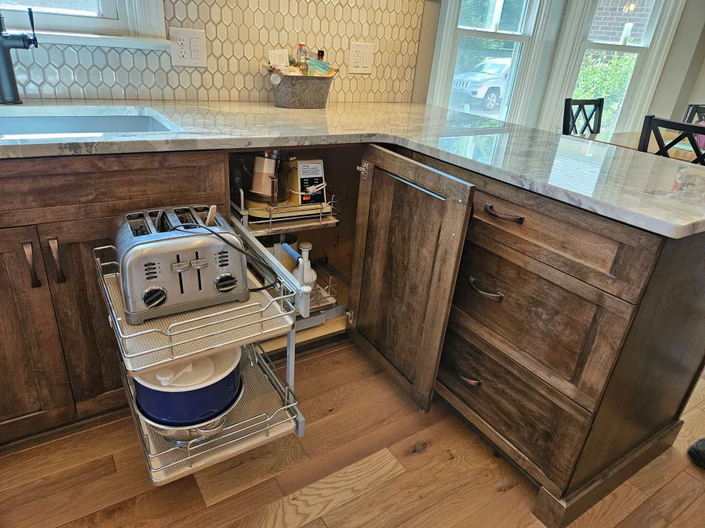 Modern Kitchen Renovation Featuring Various Storage Solutions by Kitchen Solvers Of Spring Hill - Photo 15