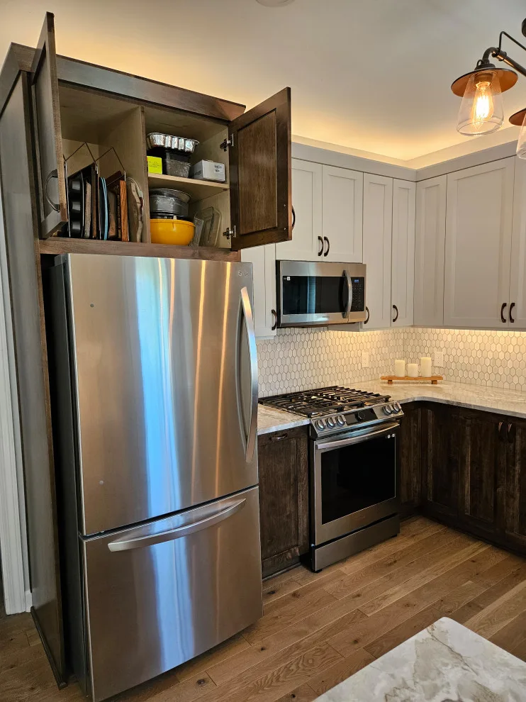 Modern Kitchen Renovation Featuring Various Storage Solutions by Kitchen Solvers Of Spring Hill - Photo 22