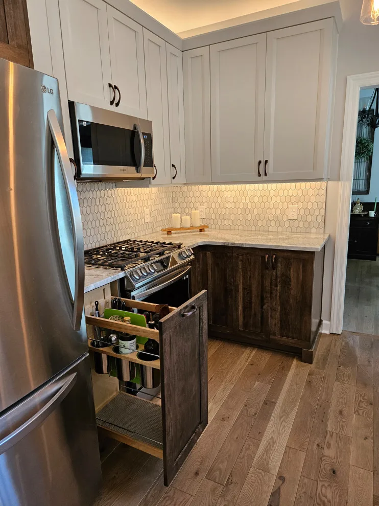Modern Kitchen Renovation Featuring Various Storage Solutions by Kitchen Solvers Of Spring Hill - Photo 6