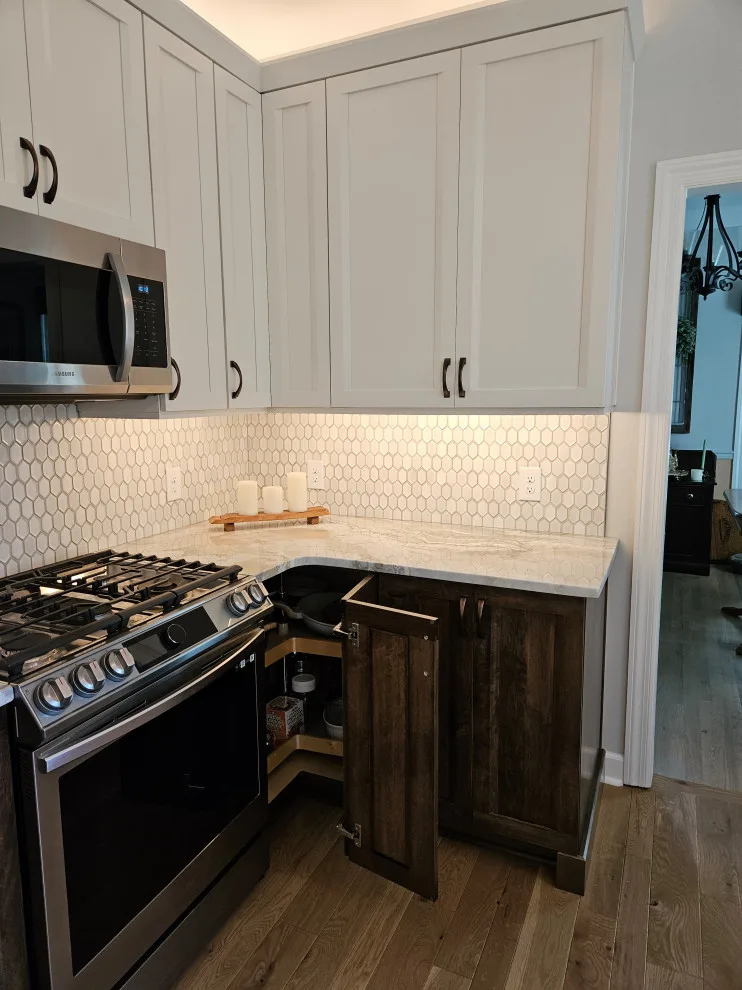 Modern Kitchen Renovation Featuring Various Storage Solutions by Kitchen Solvers Of Spring Hill - Photo 29