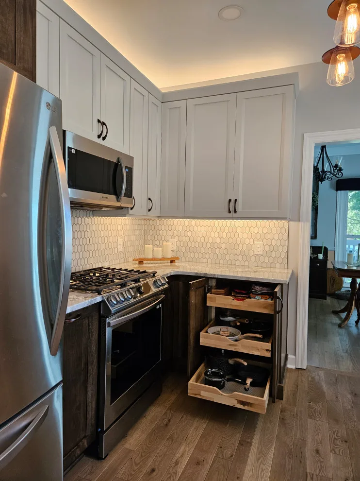 Modern Kitchen Renovation Featuring Various Storage Solutions by Kitchen Solvers Of Spring Hill - Photo 12