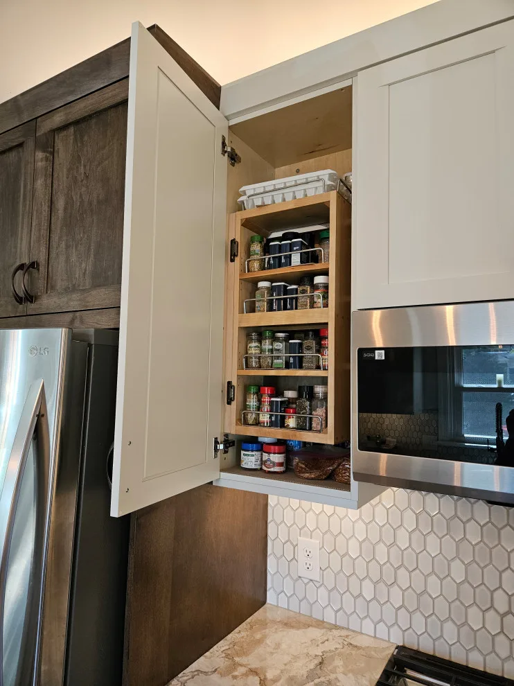 Modern Kitchen Renovation Featuring Various Storage Solutions by Kitchen Solvers Of Spring Hill - Photo 17